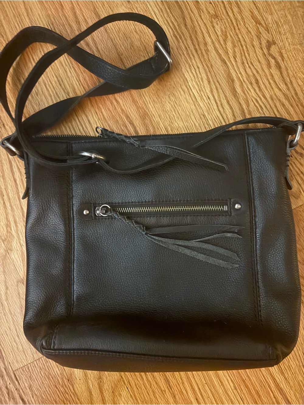 The Sak Black Leather Crossbody with Tassel Zipper